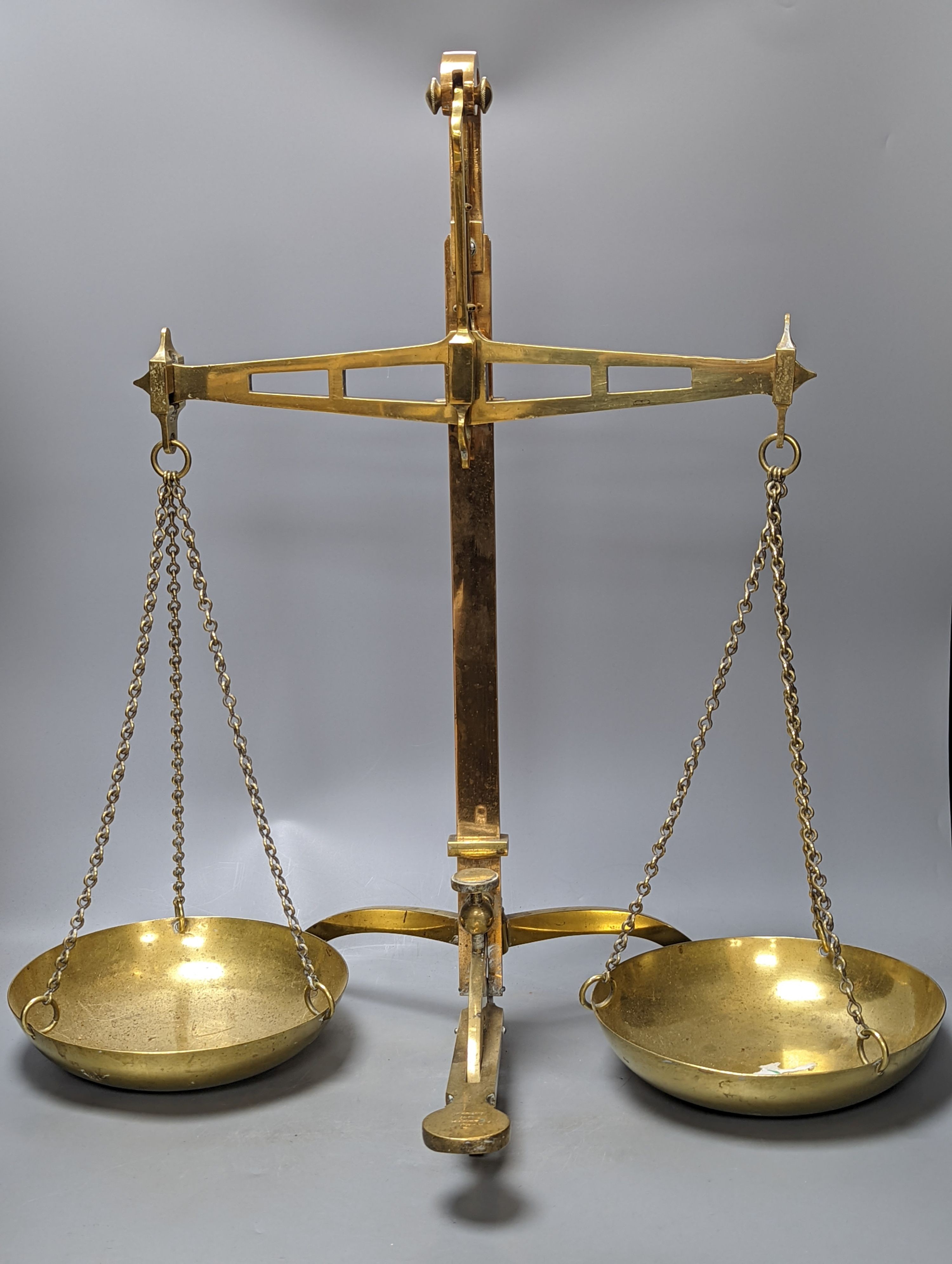 A pair of DeGrave & Co., London brass beam scales 59cm
